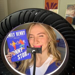 Emily Henry Instagram - 2 weeks until release, when dozens of stores across the US will be throwing their own #FunnyStoryParty(/ies), complete with games, treats, and prizes. While I won’t be there in person, I’m sending some special surprises ahead for you 😈. Find a party near you at the link in my bio.