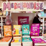 Emily Henry Instagram - Surprise! In celebration of all this week’s news, I was able to stop by one of my fave long-distance bookstores and meet their amazing booksellers WHILE signing copies of all my romcoms!! Get them while they’re hot at @therippedbodice, my friends!