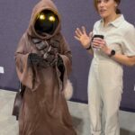Emily Swallow Instagram - This Jawa goes against the grain to walk The Way! Usually I have to make sure Jawas don’t swipe anything from me 😳 but this fella at @bigrivercomiccon did the opposite- he gave me a heartfelt gift of encouragement! I don’t know about you, but some days I wake up feeling depleted and worried and convinced that there’s not enough to go around. I can get into a mindset that I’d better take what I can and hold onto what I’ve got. But on #thisisthewaywednesday, my new Jawa friend reminds me that even when it seems to be a preordained plot point that we have to scavenge, we can step outside of that scarcity mentality and give encouragement to others. It doesn’t have to be written on a mug, so why not find a few people you can gift with encouragement today? #jawa #thisistheway #thearmorer #dojusticelovemercywalkhumbly