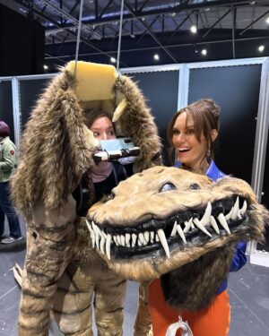 Emily Swallow Instagram - #Throwback to a year ago when I had so much fun at @starwarscelebration that I lost my voice!  That didn’t stop me from strutting down the runway with the @belgian_prop_crew, fawning over @warwickadavis, kickin’ it with @krystinaarielle and trying to keep @thegiancarloesposito and @carlweathers from stealing all the shots.  We even celebrated @therealkateesackhoff’s bday with a cake of…well, her. 

The best part was having @breewelchandhenry with me the whole weekend!

Let’s do it again in Japan, shall we?

#armorerapproved #thisistheway #tbt #throwbackthursday #london #starwarscelebration #themandalorian #glam