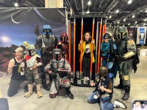 Emily Swallow Instagram - Is there a better place to be on Star Wars Day than at a fan convention?

The joy was absolutely electric.

However, we all know that, no matter how boisterous and confident we may seem on the outside, there could be shadows lurking beneath the surface that no one knows but we ourselves. 

On #thisisthewaywednesday, I want to tell you about a group of fans I met who walk The Way in a real, practical, uplifting way that was truly a day-to-day endeavor.  They’d been talking online for a year, and this convention was their first in-person meeting.  Between them, they knew they were dealing with severe social anxiety, a seizure disorder and other physical and emotional difficulties that might very well keep many people home in isolation.  But they also had something else in common: a desire to trust each other, to practice vulnerability and to support each other.  I saw them multiple times through the weekend in various states of joy and exhaustion, and I heard how they navigated tricky moments including panic attacks.  At the end of the convention, they were tired and ready for rest, but they were SO joyful that they’d had the experience and stuck with each other (and with themselves) through it all.

I am continually inspired by the way all of you lift each other up even with a strength you didn’t know you had.  When we are acting in service to someone we love, we realize we could probably stand to show ourselves that same love, gentleness and courage.  This is the Way.

P.S. I lost track of which of my fabulous Armorers was which, so please forgive me if I’ve mistagged you or didn’t know your handle!  Tag yourselves please!

#mentalhealthawareness #thisistheway #community #comiccon #anxiety #loveoneanother #thearmorer #alwayskeepfighting