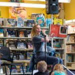 Emily Swallow Instagram - Y’all, if you’re ever invited to story time with @therealkateesackhoff, go! We got to read to some foundlings at @jaxlibrary while we were in town for @collectiveconvention. She had laryngitis but that did not stop her! Also- the entrance to the children’s section is magical. I wanted to stay there listening to forest sounds all day! #tbt #throwback #thisistheway #forthefoundlings #emilyswallow #kateesackhoff #girlpower #storytime #dropeverythingandread #library