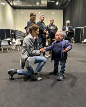 Emily Swallow Instagram - #Throwback to a year ago when I had so much fun at @starwarscelebration that I lost my voice!  That didn’t stop me from strutting down the runway with the @belgian_prop_crew, fawning over @warwickadavis, kickin’ it with @krystinaarielle and trying to keep @thegiancarloesposito and @carlweathers from stealing all the shots.  We even celebrated @therealkateesackhoff’s bday with a cake of…well, her. 

The best part was having @breewelchandhenry with me the whole weekend!

Let’s do it again in Japan, shall we?

#armorerapproved #thisistheway #tbt #throwbackthursday #london #starwarscelebration #themandalorian #glam