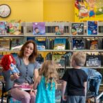 Emily Swallow Instagram - Y’all, if you’re ever invited to story time with @therealkateesackhoff, go! We got to read to some foundlings at @jaxlibrary while we were in town for @collectiveconvention. She had laryngitis but that did not stop her! Also- the entrance to the children’s section is magical. I wanted to stay there listening to forest sounds all day! #tbt #throwback #thisistheway #forthefoundlings #emilyswallow #kateesackhoff #girlpower #storytime #dropeverythingandread #library
