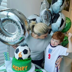 Emily Symons Instagram - Happy 6th birthday my beautiful boy 💙⚽️Look at his amazing cake (that has smarties inside!) made by our darling @lauren_e_hamilton 💜 A lockdown birthday that was made so special by his school teachers, little friends, Mums sending videos, FaceTime chats with cousins and beautiful family and even happy birthday sung to him by Aunty Lally and family from the front garden! So much love and kindness 🎈thanks to everyone who reached out today 🤗 it made me forget I have nine weeks regrowth 🥳🤦🏼‍♀️