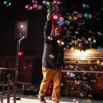 Emily V. Gordon Instagram - “I want the boys to come onstage to something magical, like bubbles.” “Yes, but how?” “Don’t worry, @mikerosenstein and I have got you.” Pics by the incomparable @tylerossity, our former photographer who has so much new fancy equipment and is still just as cool as ever.
