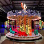 Emily V. Gordon Instagram - If you live in LA, you kinda have to go to this. In 1987, a bunch of hip artists got together to build a working theme park for kids in Germany. Keith Haring. Rebecca Horn. Dali. Basquiat. Many others. It was open for a bit, and when it closed, it was packed up into storage containers and forgotten. The people of @lunaluna tracked down the storage containers, unpacked and cleaned it all, and it is now set up in downtown LA. You can’t ride the rides, but it’s magical and transgressive and deeply weird. An excellent time. See it before it moves to New York! Not sponcon- I just really loved it.
