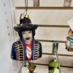 Emily V. Gordon Instagram - Saw this ornament in a Christmas store, and I’m desperate to know: WHO IS THIS SUPPOSED TO BE?