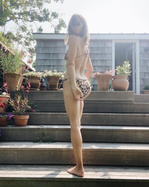 Emily Wickersham Instagram - The story of me and a @shopdoen bikini
Girl in bathing suit: 
sits, stands, looks, stands, dances, twirls, sits, ties, rests, pretends to be done with a big day of surfing tiny waves, etc. 
The end.