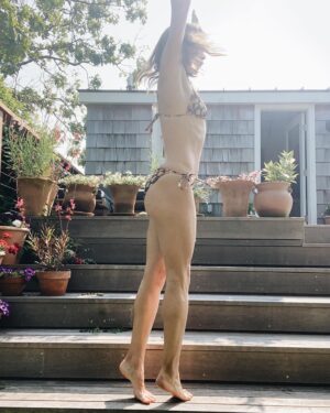 Emily Wickersham Instagram - The story of me and a @shopdoen bikini
Girl in bathing suit: 
sits, stands, looks, stands, dances, twirls, sits, ties, rests, pretends to be done with a big day of surfing tiny waves, etc. 
The end.