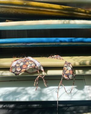 Emily Wickersham Instagram - The story of me and a @shopdoen bikini
Girl in bathing suit: 
sits, stands, looks, stands, dances, twirls, sits, ties, rests, pretends to be done with a big day of surfing tiny waves, etc. 
The end.