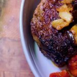 Emma Myles Instagram – Hi I made this pork chop a few nights ago and it was friggin amazing and the supporting cast was cheddar polenta with roasted eggplant and tomato confit and yes I was watching Real Housewives of the Potomac when I shot the glamour video thank you K BYE