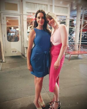 Emma Myles Instagram - *Possible ED trigger warning*
Hi guys it’s me again coming in to blast your feed with some sweet & sour but back to sweet body feels. It was my dear Jenna’s birthday dinner last night. We spent the night before having too much fun at karaoke to take any pictures so we decided to remedy that after dinner. A beautiful dinner. Delicious. The people and the food. Of no planning to match on our own Jenna and I were both wearing dresses that had knots. We posed. I saw the picture and had a body dysmorphic flare up. The bump line and the shadowing made me hate my stomach. Made me hate that I didn’t turn the other way. Made me hate that I hadn’t leaned on my back foot to elongate my midsection to make myself look thinner…the way we were taught to do for red carpet photos. Yes, even though I’ve been in recovery for my disorder for over 2 years these thoughts still appear. Sometime so aggressively that I find myself mentally backsliding into the familiar territory of how I will make up for it. But not last night. I let the feeling in, I decided that the fun I was having would not be ruined by my brain and I let it go. This is progress. And it was progress that had been planted at the beginning of the night when our server came to take our order and a conversation started about “working it off” before we had even taken our first bites. I have been actively refusing this mentality ever since I began my recovery journey. Diet culture jargon and guidelines in general are something I have completely turned away from for the sake of my mental and physical health. So luckily, even before the picture was captured, I was already in the headspace of defiance for how we are made to prioritize being less than instead of just allowing ourselves to exist. I look at the picture now and know that my stomach looks like that because it’s really strong. And really healthy. And at my literal core there is power, even if the lighting sucks. I’m going to hold onto this power. I’m going to eat the food. And I’m going to enjoy my life instead of curling up in the delusions that we’ve been brainwashed to think are normal. That’s all. Ps go to @donangienyc it’s nuts. #eatingdisorderrecovery