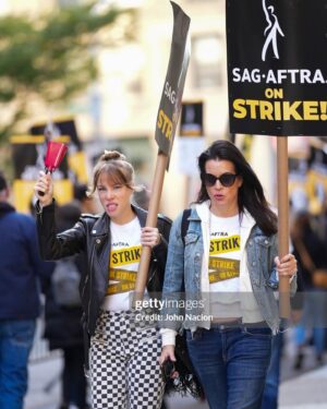 Emma Myles Instagram - Today was a wild turn out walking alongside our peers. Shout out to my bestie Jenna who looks exactly like Neve Campbell here, shout out to my face for summing up the vibe of how we all feel, and shout out to finally meeting my hero Radio Man. I can’t tell you how many times I’ve yelled “SCHOOL IS FOR FOOLS LOOK AT MEEEEE” out of context. It was a big day. The solidarity is unbelievably strong. I will always be proud to be an actor. And hopefully someday soon the studios will be proud to have us and give us a contract that reflects that. Until then, we’ll see you on the line. 
📸 @gettyimages