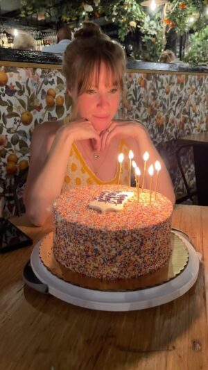 Emma Myles Instagram - You know, I was seeing everyone’s years in review and I was like, I feel like I did nothing. But then I was like, wait a lot of things happened this year. We had 2 🪧’s, I turned 40, I was blessed by Tori Amos, I got my first tattoo, I went back to my homeland, and I basically wrote 2 books. It’s hard when things are happening in a vacuum. It feels like time is just moving and here you are, standing still, the same. But I’m not the same. I am older. My brain has worked harder than it ever has. And I’m coming up on 3 years eating disorder recovery which is enough in and of itself. I don’t have a new year new me goal. I don’t need to be new. And neither do you. I just want to fill my life with happiness and gratitude and art and people I love. I just hope I don’t cut my bangs too short like I did 20 minutes before Valentine’s Day dinner last February. It took way too long to grow them back to normal. To all of my friends who understood that I just couldn’t, to my husband who pulled me up when the quicksand was swallowing me, to my cat who will always be my soulmate, to food, to the miracle of the human body and the resilience of the human mind, to a year that really and truly happened… I am grateful. Happy new year.