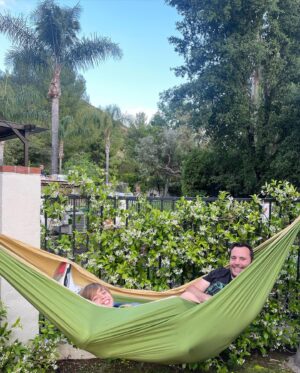 Emme Rylan Instagram - Did @dmoney596 fall out of this hammock when he first tried to get in it? 😂Yes, yes he did. But they cute so it was worth it, right babe?