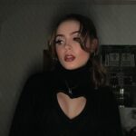 Emmy Perry Instagram - 🖤I’m finding being alive fascinating🖤 . . . . . . . . . . . . . . . . #aesthetic #explore #explorepage #coquette #ootd #makeup #vintage #retro #fashion #poorthings #darkaesthetic #dark #love