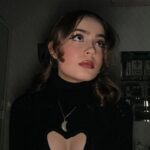 Emmy Perry Instagram - 🖤I’m finding being alive fascinating🖤 . . . . . . . . . . . . . . . . #aesthetic #explore #explorepage #coquette #ootd #makeup #vintage #retro #fashion #poorthings #darkaesthetic #dark #love