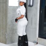 Erica Pinkett Instagram - From the concrete grew a rose 🌹👑 📸 : @jeffgetcash MUA: @ohkeliyah Hat: @adidasy3 Jumpsuit: @gstarraw Boots: @givenchy Gloves/earrings: @chanelofficial