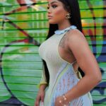 Erica Pinkett Instagram - You are the artist of your life! Make it beautiful 🫶🏽❤️🙏🏽 📸 @tropicpic 💄 @picaasso 👗 @robertaeiner 🩴 @hermes