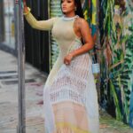 Erica Pinkett Instagram - You are the artist of your life! Make it beautiful 🫶🏽❤️🙏🏽 📸 @tropicpic 💄 @picaasso 👗 @robertaeiner 🩴 @hermes