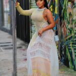 Erica Pinkett Instagram - You are the artist of your life! Make it beautiful 🫶🏽❤️🙏🏽 📸 @tropicpic 💄 @picaasso 👗 @robertaeiner 🩴 @hermes