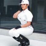 Erica Pinkett Instagram - From the concrete grew a rose 🌹👑 📸 : @jeffgetcash MUA: @ohkeliyah Hat: @adidasy3 Jumpsuit: @gstarraw Boots: @givenchy Gloves/earrings: @chanelofficial