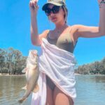 Erin Barnett Instagram - I’m getting better at this! 🎣 I’m smiling on the inside 😅 On the outside I’m like “eww please don’t touch me” but also like “QUICK GET A PICTURE!” 📸😎⁣ ⁣ ⁣ ⁣ #fishing #pro