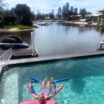 Erin Barnett Instagram – So many “insta influencer worthy photo opportunities” here and this is what I got. (And when I say “this is what I got” I mean this is what Mick took”😂 but I still love it. 🩵☀️ #photooftheday #poolside #drinkinhand #holidays