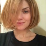 Erin Richards Instagram - Shout out to my girl @gina.lauren - wonder colourist! I love you and I love all the looks you’ve given me over the years (especially David Bowie 🤣) #crownseason5 #premiere #redhead #cutler #cutlersalon #colour #hair #davidbowie