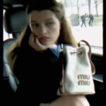 Ever Anderson Instagram - Check out my @miumiu Video Diary for @genvmagazine from Paris Fashion Week! ♥️🥐 #miumiufw24 #miucciaprada #genvmagazine #ad
