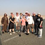 Evnika Sadvakassova Instagram - how it was😱 red-hot asphalt, wind and desert sand💀, saved as best they could. But, the work was done perfectly well! Thank you @danielaskill for inviting our family to your project❤🤖@sidilarbicherkaoui 💞 @patrickmwalshjr 💞 @yandova23 💞