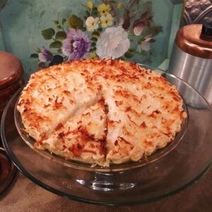 Faith Ford Instagram - Here it is folks! First Mama Pat pie of 2022! Fresh, creamy coconut custard! Heaven on a plate! Yum! 😋🥧🙌🏼#mamapatspies #goodforthesoul