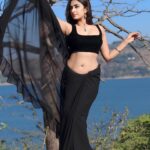 Farnaz Shetty Instagram - “Recipe for Dreams Made of Reality , Mixing the Ingredients of Aspiration, Hard Work, and Belief 🖤💙 . 📸 @starganza ♥️ 👗 @navya.marouthu 💝 . . . . . . . . . . . . #dream #Reality #water #earth #sky #blue #saree #black #pose #beauty #fit #focus #glamour #glam #fashion #instafashion #instamood #instagram #instagood #instadaily #instalike #desire #captivate #spellbound #photoshoot #photography #hair #makeup #imperfect #perfect