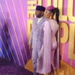 Fatima Robinson Instagram - So full of gratitude for all the people who put this movie together. Beautiful Night💜Masterpiece of a Movie….The Color Purple will blow you away. Hair @lenajaye_ Make up @bobbierileybeauty Earrings and cuffs @lisaeisnerjewelry Rings @_neoancient_ Hat @houseofmalakai Dress @alexperryofficial