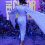 Fatima Robinson Instagram - So full of gratitude for all the people who put this movie together. Beautiful Night💜Masterpiece of a Movie….The Color Purple will blow you away. Hair @lenajaye_ Make up @bobbierileybeauty Earrings and cuffs @lisaeisnerjewelry Rings @_neoancient_ Hat @houseofmalakai Dress @alexperryofficial