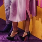 Fatima Robinson Instagram - So full of gratitude for all the people who put this movie together. Beautiful Night💜Masterpiece of a Movie….The Color Purple will blow you away. Hair @lenajaye_ Make up @bobbierileybeauty Earrings and cuffs @lisaeisnerjewelry Rings @_neoancient_ Hat @houseofmalakai Dress @alexperryofficial