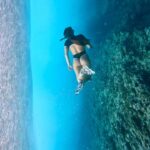 Felicity Palmateer Instagram - Playing underwater astronauts at Teahupo’o // thanks for swimming on the West bowl / close out section @mashiano with my @gopro It’s slightly more dangerous than what it might appear 😂