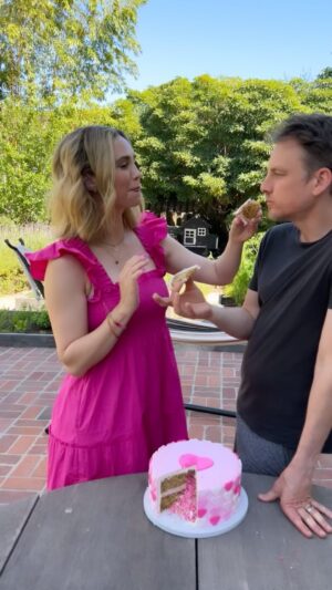 Fiona Gubelmann Instagram - Happy Anniversary @thebestalexweed 
There’s no one whose face I’d rather shove cake in 💗 Here’s to another 752 years

Best Cake Ever from @yvonnesvegankitchen
Literally, she makes my favorite cakes ever. I pretty much avoid cake the whole year because nothing compares to Yvonne’s cakes and then when I’m in the US, we order one to enjoy 🍰 

🎂💗 🎂💗🎂💗🎂💗🎂💗🎂💗🎂
•
👗 @hillhouse 
Bracelet is from the incredible @pyrrhajewelry @trevorproject collab 🌈 
(More to share about this tomorrow)
•
•
•
•
#fionagubelmann #anniversary #wedding #weddinganniversary #cake #vegan #glutenfree #plantbased #pyrrah #trevorproject #pyrrahjewelry #loveislove #equality #equalityforall