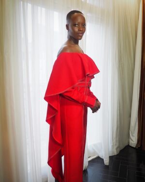 Florence Kasumba Instagram - #BlackPanther #WakandaForever London press tour. Styling @hollyevawhite @thewallgroup  Make up @rebekahmakeup Jumpsuit @thebemagugu Shoes @reiss Jewelry @cartier #florencekasumba