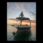 Frédérique Bel Instagram - #Boat #oceanindien #swimsuits #80sfashion Before the storm … .#SunSet #Mauritus #look80s #beachlife #beach #beachbody