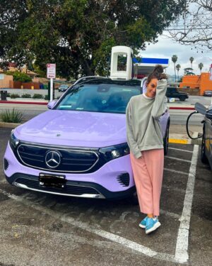 Frankie Shaw Instagram - I lied to my family about this car. It was actually getting wrapped purple by my boy in receda - shout out to @ev_autoworks - while we were all together for my mothers 75th in Macon Georgia last December. My older brother especially would never let me live it down. An all electric PURPLE Mercedes. Nothing like that good Boston shaming to keep you in check. But here I am. Just a girl obsessed with purple who forgot to charge her car last night sitting at a Ralph’s in Pasadena with her fellow man. 💜
