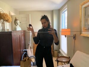 Frankie Adams Instagram - Just me, my new bag of skincare & a plum I’m eating.