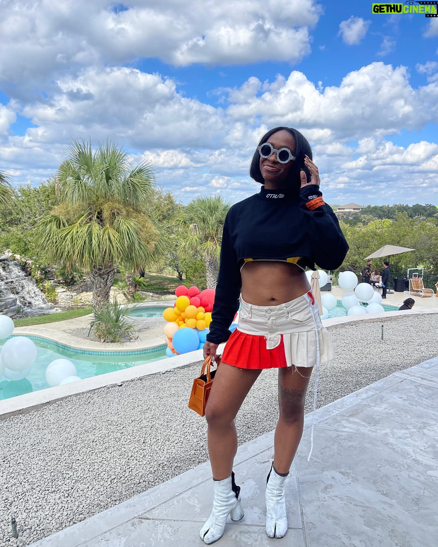 Freddie Ransome Instagram - my favorite look from @afro.tech weekend! thanks @culturehouseofficial for having me spin some chunes! top: @heronpreston skirt: @ansarelithelabel boots: @maisonmargiela bag: @brandonblackwoodnyc sunnies: @akila.la X @chinatownmarket