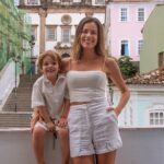 Gabriela Dias Instagram - Sharing a bit of the Pelourinho’s history makes me happy! Pelourinho is one of the main tourist attractions in the city of Salvador, Bahia, Brazil. It is a historically and culturally rich neighborhood known for its cobblestone streets and colorful mansions. Pelourinho has significant historical importance as it was the center of political, religious, and cultural life in Salvador during the 17th and 18th centuries. In the past, this location was used to punish slaves and criminals, making the pelourinho a symbol of oppression. Currently, Pelourinho has undergone a revitalization process and has become a vibrant area with craft shops, restaurants, bars, and music venues. The region also hosts various cultural manifestations such as capoeira performances, folk dances, and live music. Moreover, Pelourinho is famous for its candomblé terreiros, which are sacred places for the practice of Afro-Brazilian religion. These terreiros are open to visitors interested in learning more about candomblé culture and traditions. If you are planning to visit Salvador, Pelourinho is definitely a place worth exploring. It is a unique experience to get to know the history, culture, and diversity of the city. Even if you only spend a few hours here, I’m sure you will enjoy it. Brian and I are really enjoying our adventure of coming from Maraú to Salvador by boat! 📷 @yurimatosart @pousadabahiapelo