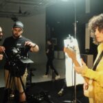 Gaby Moreno Instagram - Some #BTS from the “Solid Ground” video shoot in Madrid. Song and video out now! ⚡️ Les dejo un poquito de lo que fue la filmación de “Solid Ground” junto a este gran equipo en Madrid!   Una producción de SMART FACTORY WORLD @smartfactoryworld   dirección JOSEPH ROS   @joseph_ros   producción MARÍA DE LA RICA @mdelarr   dirección de fotografía EDU SÁENZ @edu_saenz93   dirección de arte ISABEL ORTEGA @isaortegao   estilismo MARÍA DE LA RICA @mdelarr   edición JOSEPH ROS   @joseph_ros   colorista EDU SÁENZ @edu_saenz93   efectos visuales (vfx) JOSEPH ROS • EDU SÁENZ • DANIEL ALEMÁN @joseph_ros  @edu_saenz93  @daniel.alemán.art   1er AC PEDRO CALAMAR @calamardojo   gaffer FERNANDO RIOS @_fernando_rios   eléctrico JUAN QUEVEDO @juanquevedo_es   maquillaje y peluquería GEMA BAJO @gemamakeup.es   asistencia de arte ANGÉLICA BUSTOS angie_mbm   atrezzista ARNOLDO JOSÉ FERRER (ISLA PIÑATA) @islapinatamadrid   asistencia de producción MARIAN DIAZ LLANES @marian.marian.1048   localización ATLÁNTICO ESTUDIOS @atlanticoestudios   proveedores de equipos VISUALRENT • GECISA @visualrent.es  @gecisa_iluminacion   agradecimientos LEIVA • RICHI • KIKE • INMACULADA REVUELTA   OSCAR NORIEGA • ROBERTO •MANUEL DE LA RICA