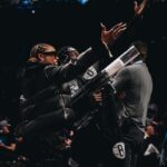 Gail Bean Instagram - I live in Brooklyn featuring Courtside Caggy @__cags 🫶🏾❤️✊🏾👑 @jumpman23 @__cags @ladi_couture @ohmy_jah @brooklynnets @barclayscenter @theafrocentricone 💄 @camaraaunique 💇🏾‍♀️ @blickybodiedit 👟 @jumpman23 💅🏾 @pickacolorbrooklyn 🧥 @rebeccaminkoff 👝 @shophaliq 📸 @kees2life #Jordan #JordanWomen