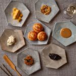 Garima Arora Instagram - 🍌🍌🍌 Kuzhi Paniyaram broken down into this sweet- savory dessert is a perfect ode to bananas and my forever love for the fruit. 1. Wild honey spiked paniyaram 2. Fermented banana caramel 3. Coconut jaggery chutney 4. Homemade butter 5. Sweet n spicy Podi with ghee 6. Star fruit jam 7. Egg Banana or Kluay Kai banana- so cute n tiny 8. Banana water Make your own bite. Find your favorites. Mix and match. Use your hands. No better way to eat.