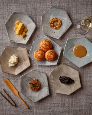 Garima Arora Instagram - 🍌🍌🍌 Kuzhi Paniyaram broken down into this sweet- savory  dessert is a perfect ode to bananas and my forever love for the fruit. 

1. Wild honey spiked paniyaram 
2. Fermented banana caramel
3. Coconut jaggery chutney
4. Homemade butter 
5. Sweet n spicy Podi with ghee 
6. Star fruit jam 
7. Egg Banana or Kluay Kai banana- so cute n tiny 
8. Banana water 

Make your own bite. Find your favorites. Mix and match. Use your hands. No better way to eat.