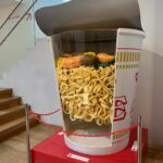 Gelsea Mae Instagram - From Momofuku Ando’s genius to our own noodle creation at the Cup Noodles Museum in Osaka! 🍜✨ #HoneymoonNoods #cupnoodlesmuseum #cupnoodlesmuseumosaka #cupnoodles #cupnoodle #honeymoon #honeymoondestination #honeymoontime #honeymoontrip #japan #uenoparktokyo #tokyotokyo #tokyojapan #tokyotower #tokyofood #tokyofoodie #japanfood #japanlife #japanphotography #honeymooning #tokyotravel #uenoexperience #japanawaits #japanfoods #cherryblossomseason #cupnoodlemuseum #noodles #noodlecup #osaka #ramennoodles